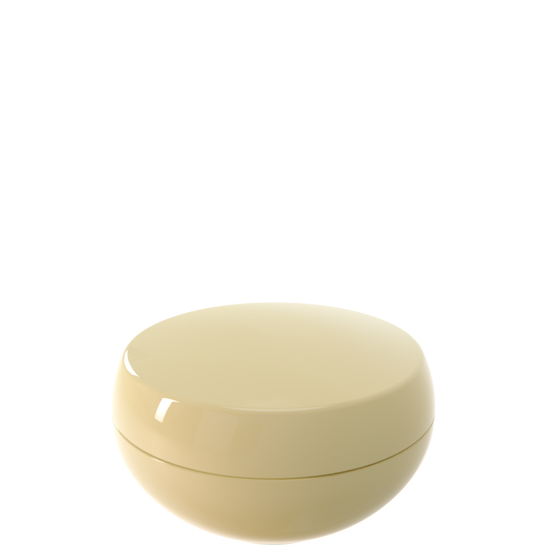 Ju 03 interchangeable cosmetic holder in sand, angled view of the domed cap