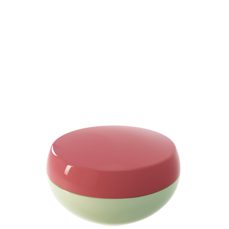 Ju 33 interchangeable cosmetic holder in rose and sage green, angled view of the domed cap