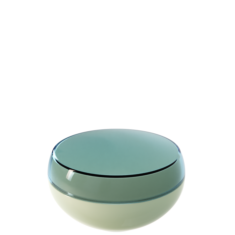 Ju 49 interchangeable cosmetic holder in sage green and pale sage, angled view of the domed cap