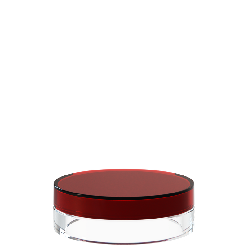 Sai 14 interchangeable cosmetic holder, red cap with a clear body, angled view of the flat cylinder