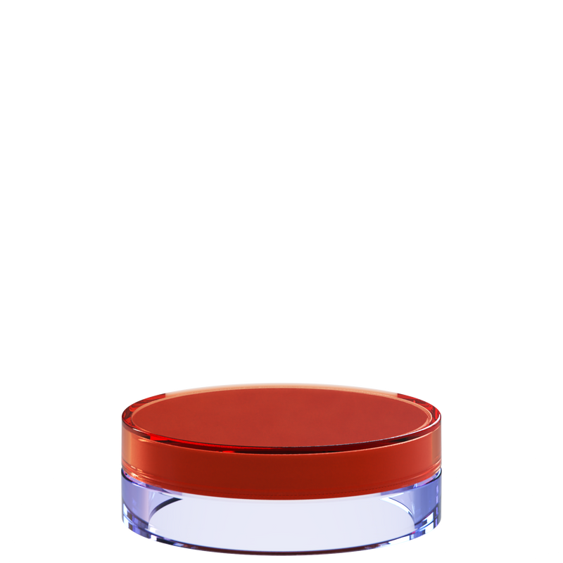 Sai 20 interchangeable cosmetic holder in dark red and periwinkle, angled view of the flat cylinder