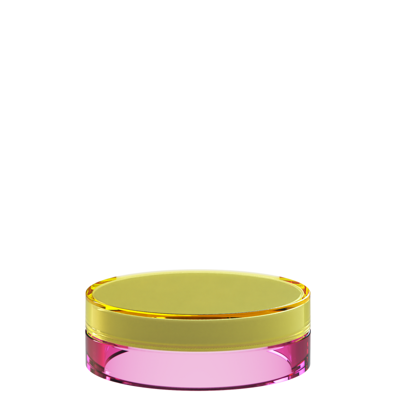 Sai 28 interchangeable cosmetic holder in amber and pink, angled view of the flat cylinder