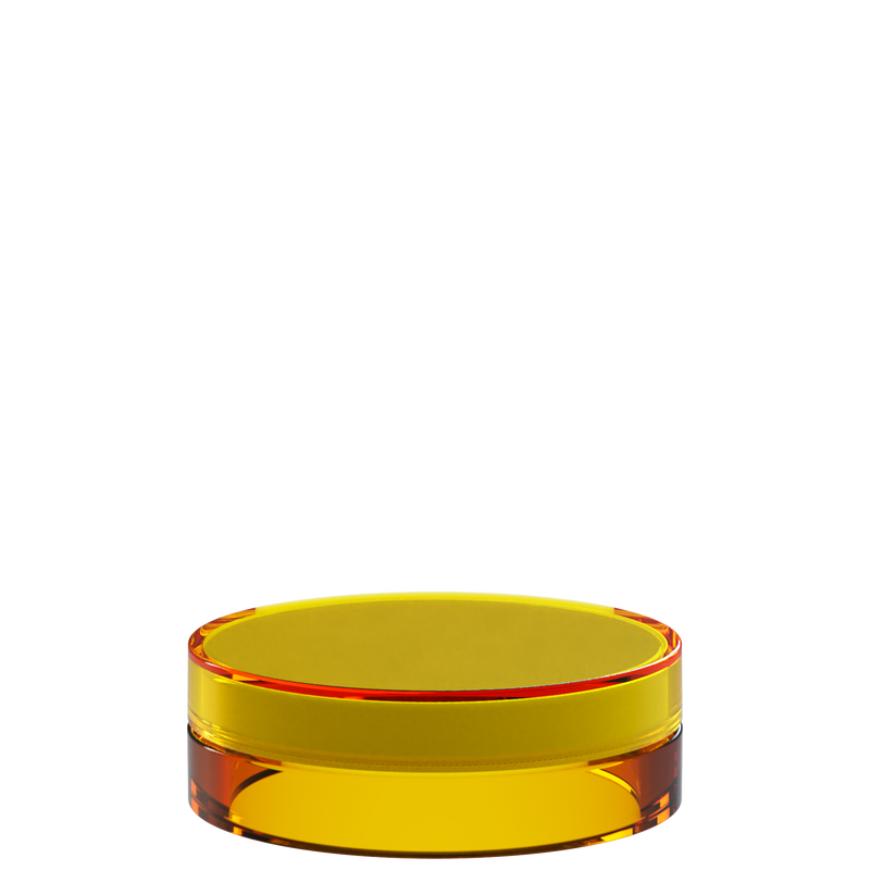 Sai 44 interchangeable cosmetic holder in gold and orange, angled view of the flat cylinder