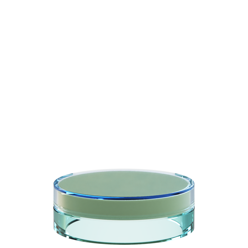 Sai 46 interchangeable cosmetic holder in blue and aqua, angled view of the flat cylinder