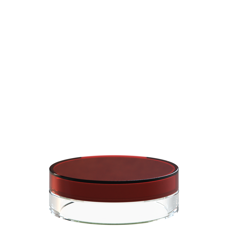 Sai 47 interchangeable cosmetic holder in dark red and clear, angled view of the flat cylinder