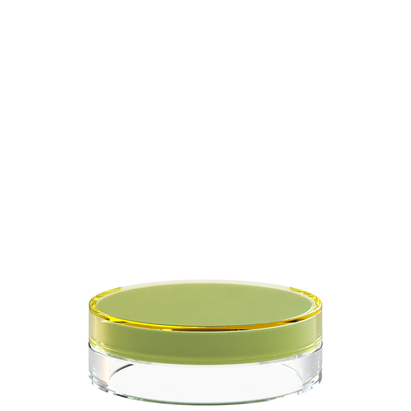 Sai 06 interchangeable cosmetic holder in yellow and clear, angled view of the flat cylinder